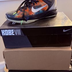 Nike Zoom Kobe 7 'All Star - Galaxy' sneaker in black, metallic silver, total orange, and volt colors