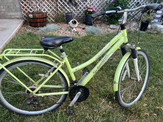Schwinn Solitaire Shimano 7 speed Green Apple color bike. Needs new Rims as is