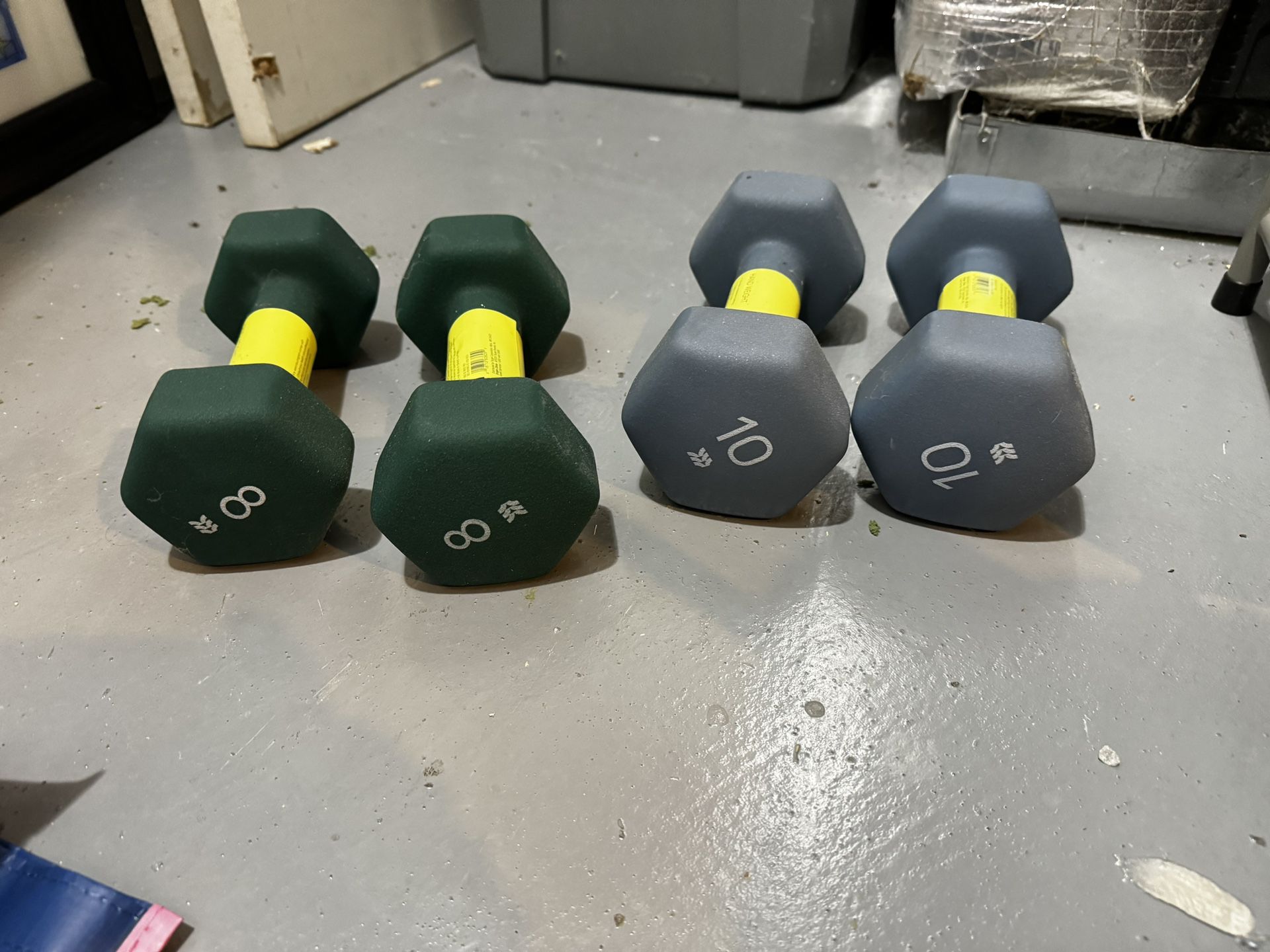 Two 8 pound and Two 10 Pound dumbbells 