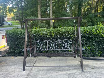 Swing with cushions