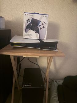 PlayStation five Pro and dual sense wireless controller