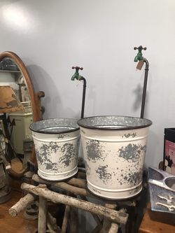 Two metal farmhouse planters 