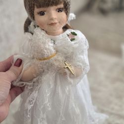 porcelain praying doll