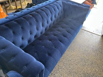 Blue velvet couches