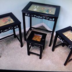 4 Chinese black lacquer nesting tables with inlaid mother of pearl jade scenes