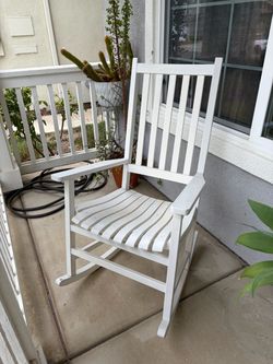 White wooden rocking chair
