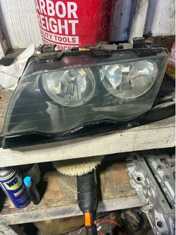 2000 bmw 323 left headlight