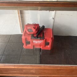 Milwaukee dry vac battery charger, and vacuum and works well used