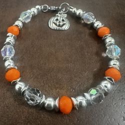 Vibrant Orange and Silver Beaded Bracelet with Pumpkin Charm
