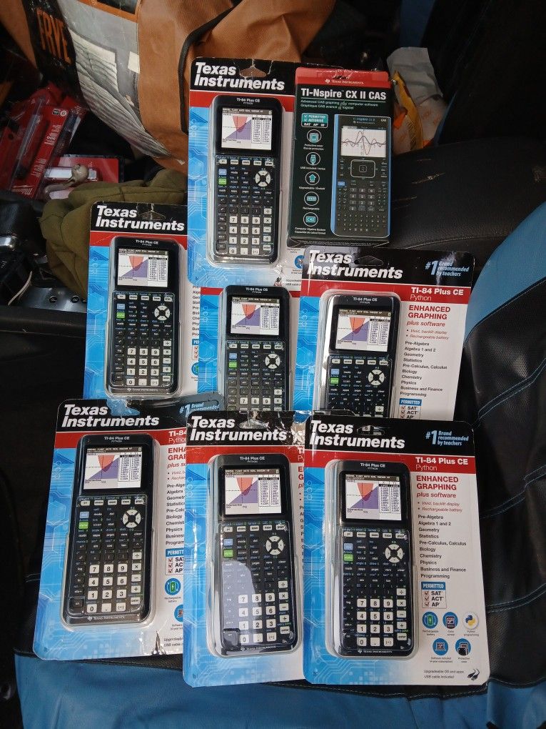 7 Texas Instruments TI-84 Plus Ce And 1 Texas Instruments TI-Nspire CX  II CAS Graphing Calculators