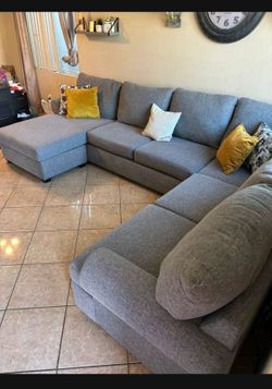 Large and super comfortable Grey Sectional Couch from Living Spaces