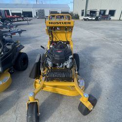 BLOWOUT  SALE ON STAND ON MOWER