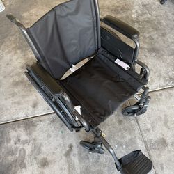 Wheel Chair with leg rests $100 OBO