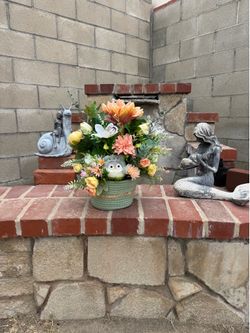 Handmade Floral Arrangement with Plush Penguin in Woven Basket