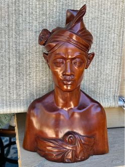 Two hand carved and polished Balinese wood busts. $100.00 each
