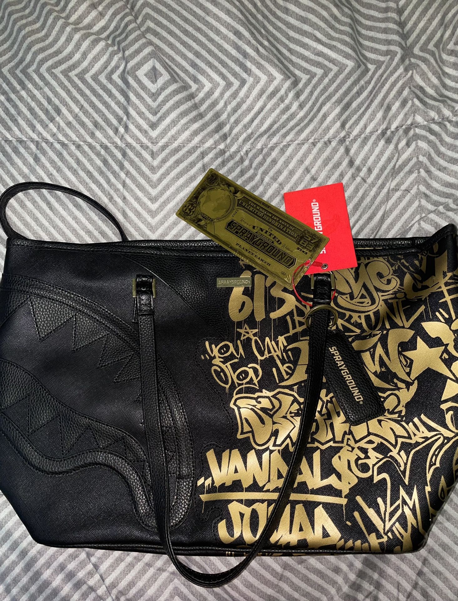 sprayground limited edition gold tote