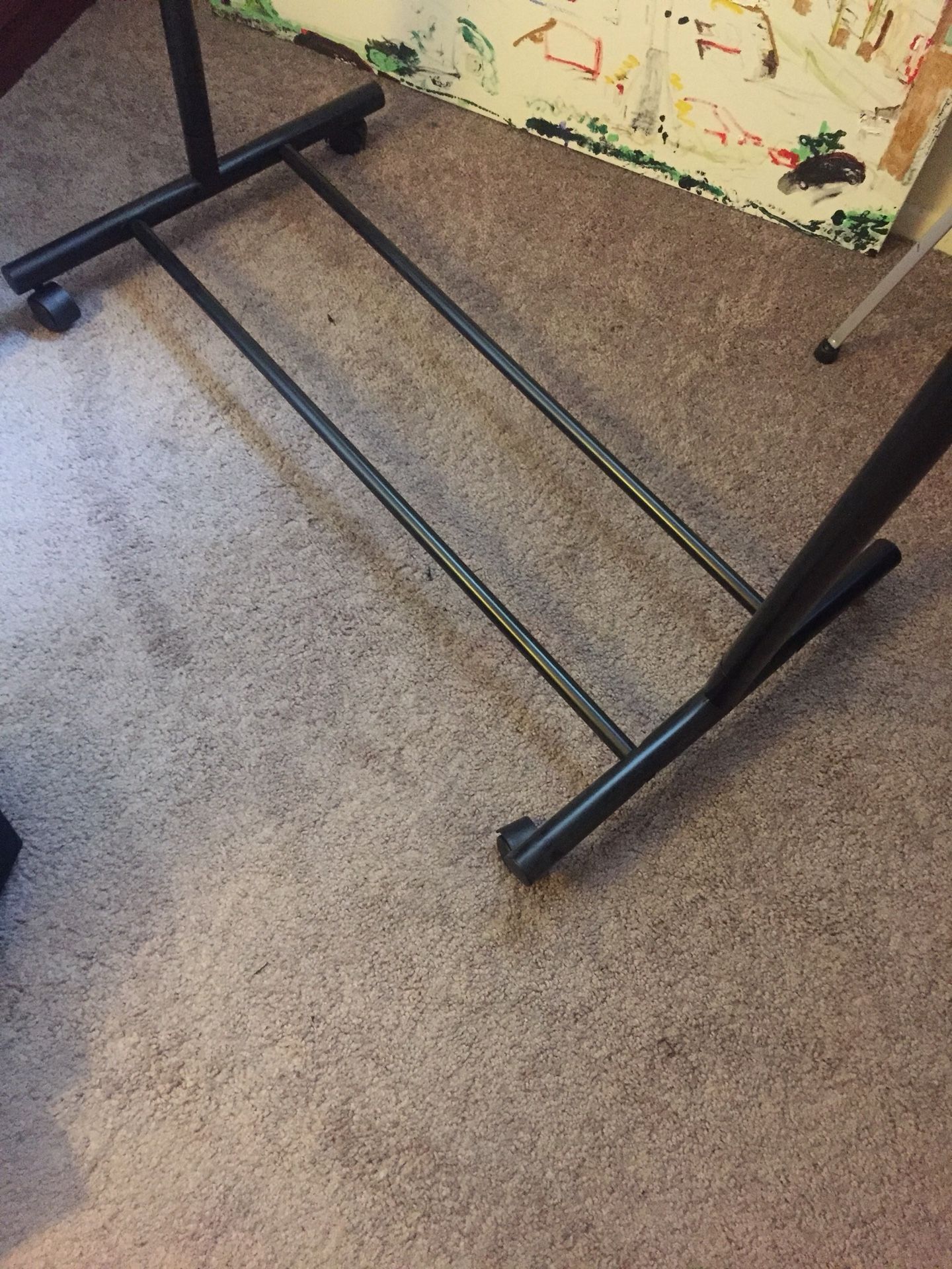 Rolling clothing rack 25$