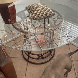 Glass dining room table with matching chairs