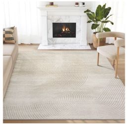 Cream Area Rug with Swirl Pattern