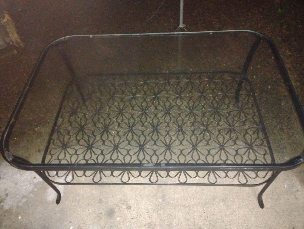 Black Iron And Glass Table With Flower Design