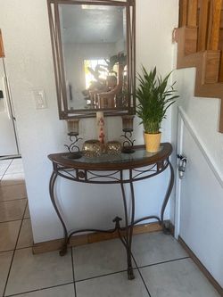 Table stand with a mirror