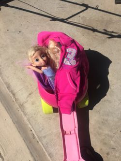 Barbie and Her Wagon waits for Toddler Little Girl to Take Her Home.