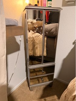 Silver mirrored armoire