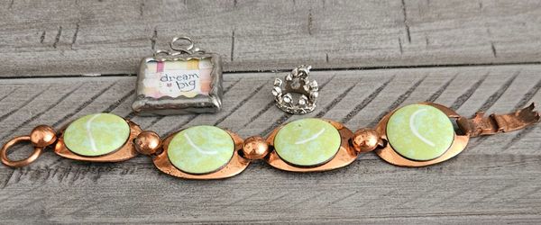 2 pendants and copper bracelet