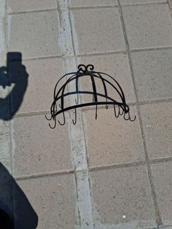 Iron rack hanging.\nPots and pans