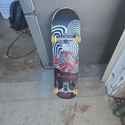 Primitive Rodriguez Bones Roses Skateboard 