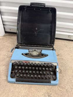 Brother Charger 11 Portable Manual Typewriter, Blue w/ Carrying Case
