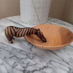 $10 Hand Carved Zebra Drinking from a Wooded Trinket Bowl. Approximately 7"x 4 1/2"