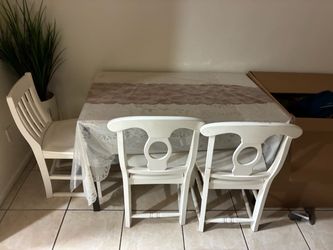 Table and 4 chairs