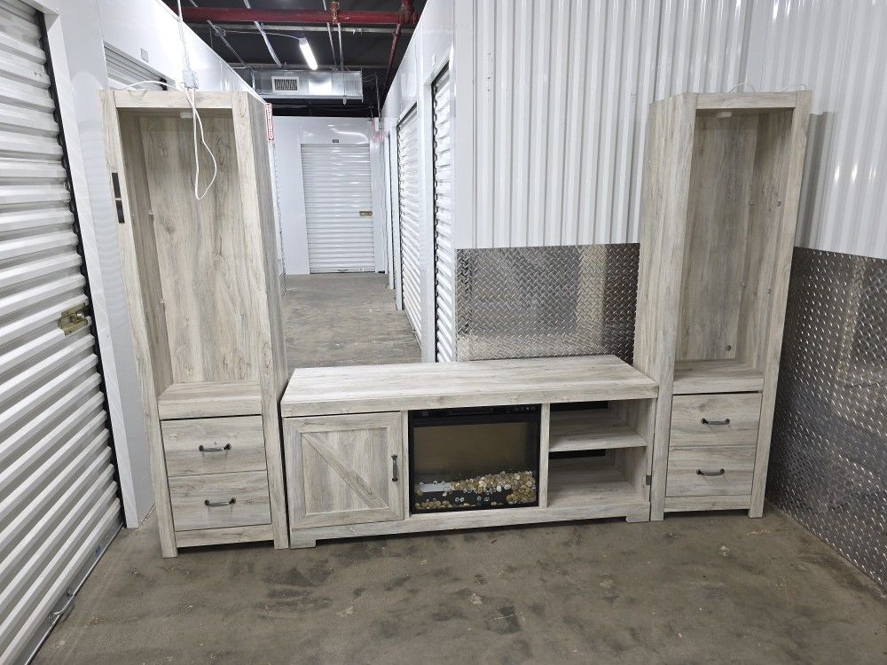 Bellaby 4-Piece Entertainment Center with Fireplace In White Wash