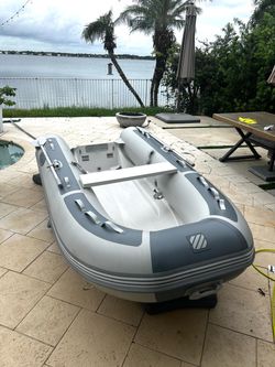 West marine Rib with 9.9hp outboard.