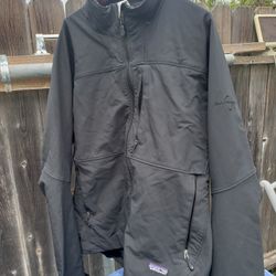 Patagonia jacket in good condition size Large flaws at bottom and collar.