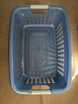 Plastic laundry storage basket