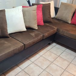 Good Condition Brown Sectional with Color Pillows