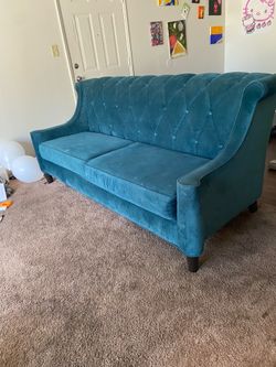 Teal velvet sofa