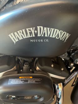 2014 flat black 883 everything stock blacked out lights 4269 miles runs perfect clean title in hand.￼