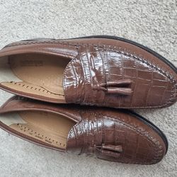 Florsheim Men's Pisa Moc Toe Tassel Loafer in cognac crocodile print leather.