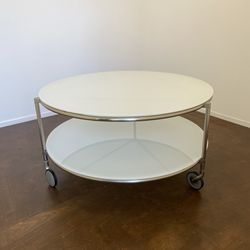 Round White Glass Coffee Table On Casters 