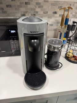 Nespresso machine. Less than a year old.