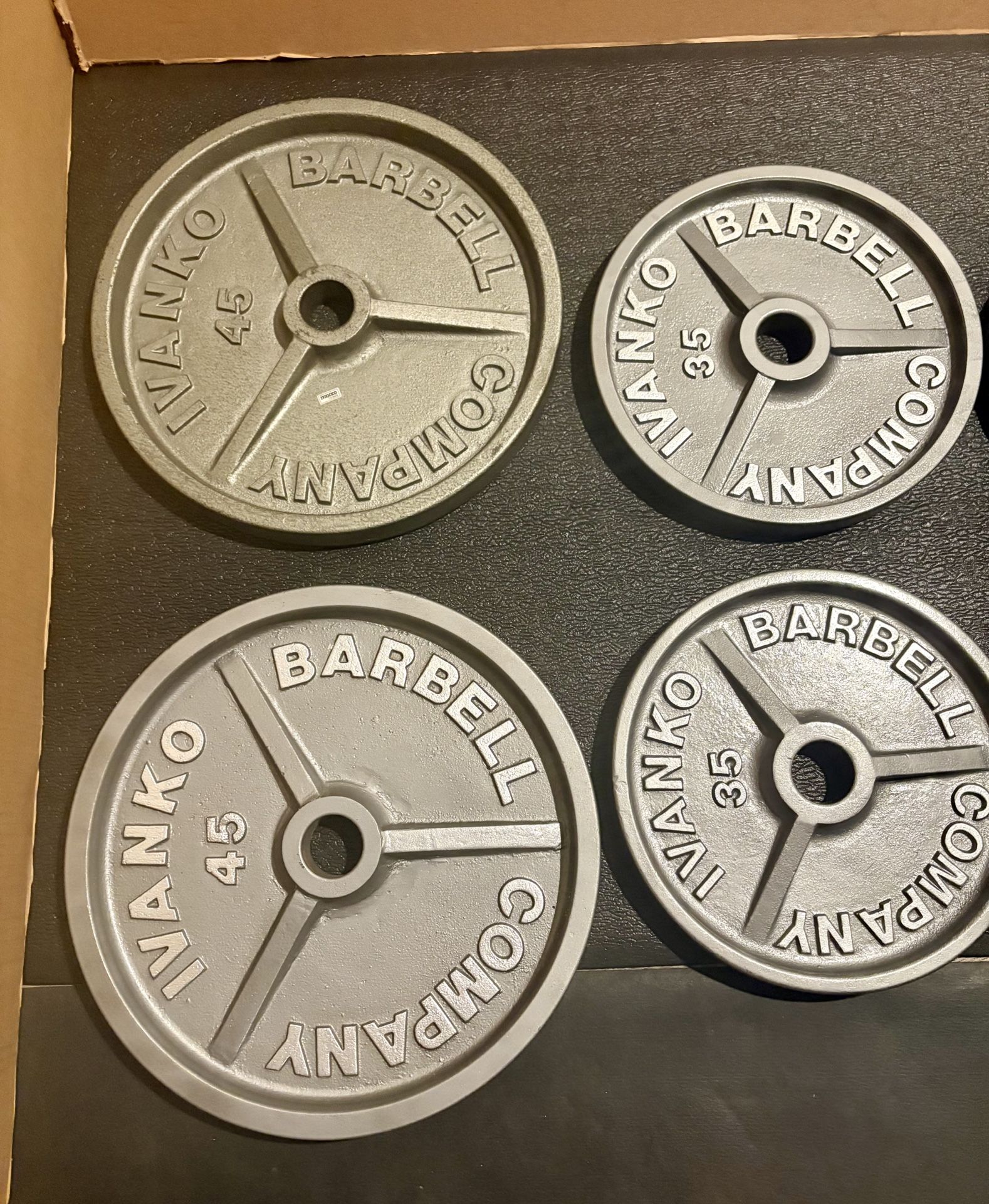 Set of Olympic Vintage IVANKO Weight Plates: Pairs of 45s, 35s, 25s and 10s. Reconditioned Total: 230 #