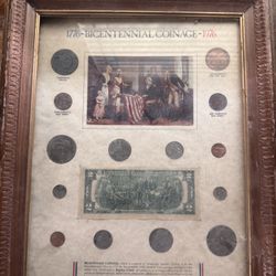 Framed Bicentennial replica coin and currency collection./Framed collection of 1976 US coins and currency.