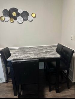 Marble dinning room table with seats