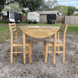 drop leaf table with two chairs (solid wood).