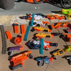 Nerf Guns!  25+ Guns, 4 Magazines, 2 Ammo Holders And More…,