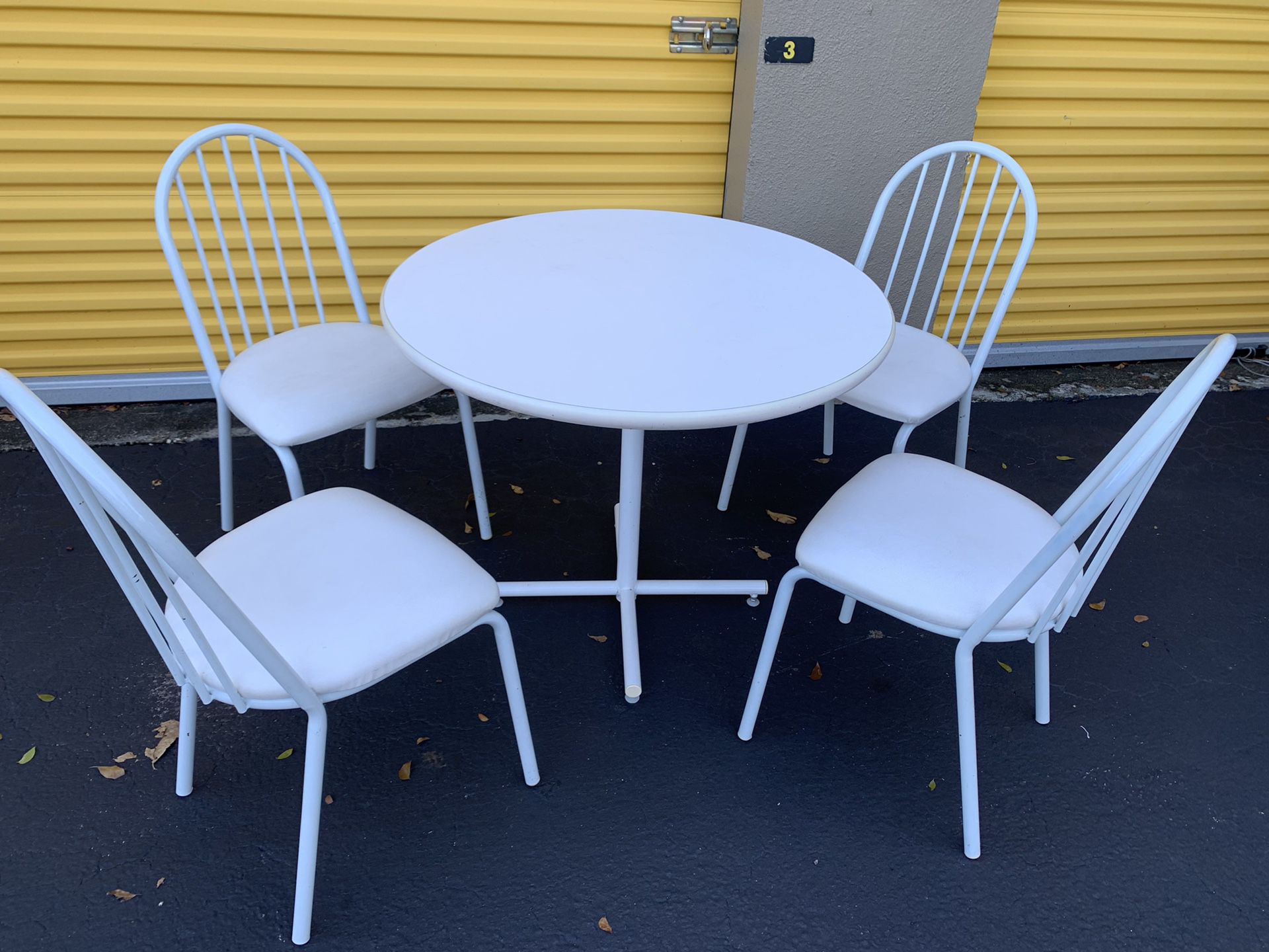 White kitchen table with 4 chairs