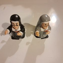 Pair Of Wind Up Nuns
